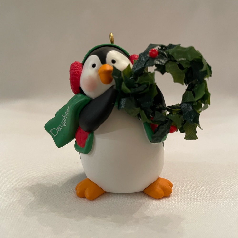 Daughter Hallmark Penguin Ornament with Green Scarf and Red Earmuffs. EUC